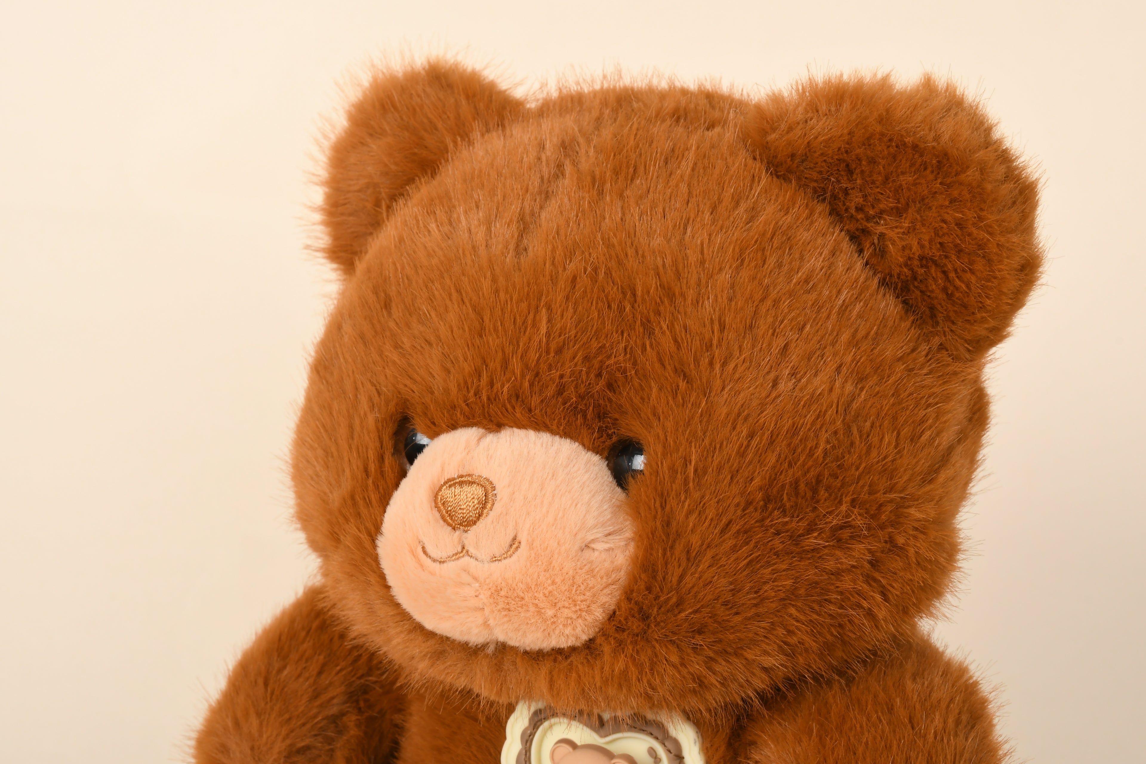 23cm Brown Spinning Bear Plush Toy with Rotatable Heart Badge - Cute Stuffed Animal Gift